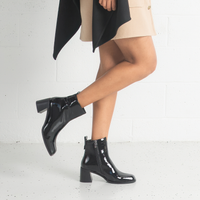Earth Black Crinkle Patent Leather Ankle Boots