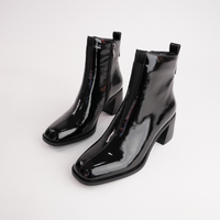 Earth Black Crinkle Patent Leather Ankle Boots