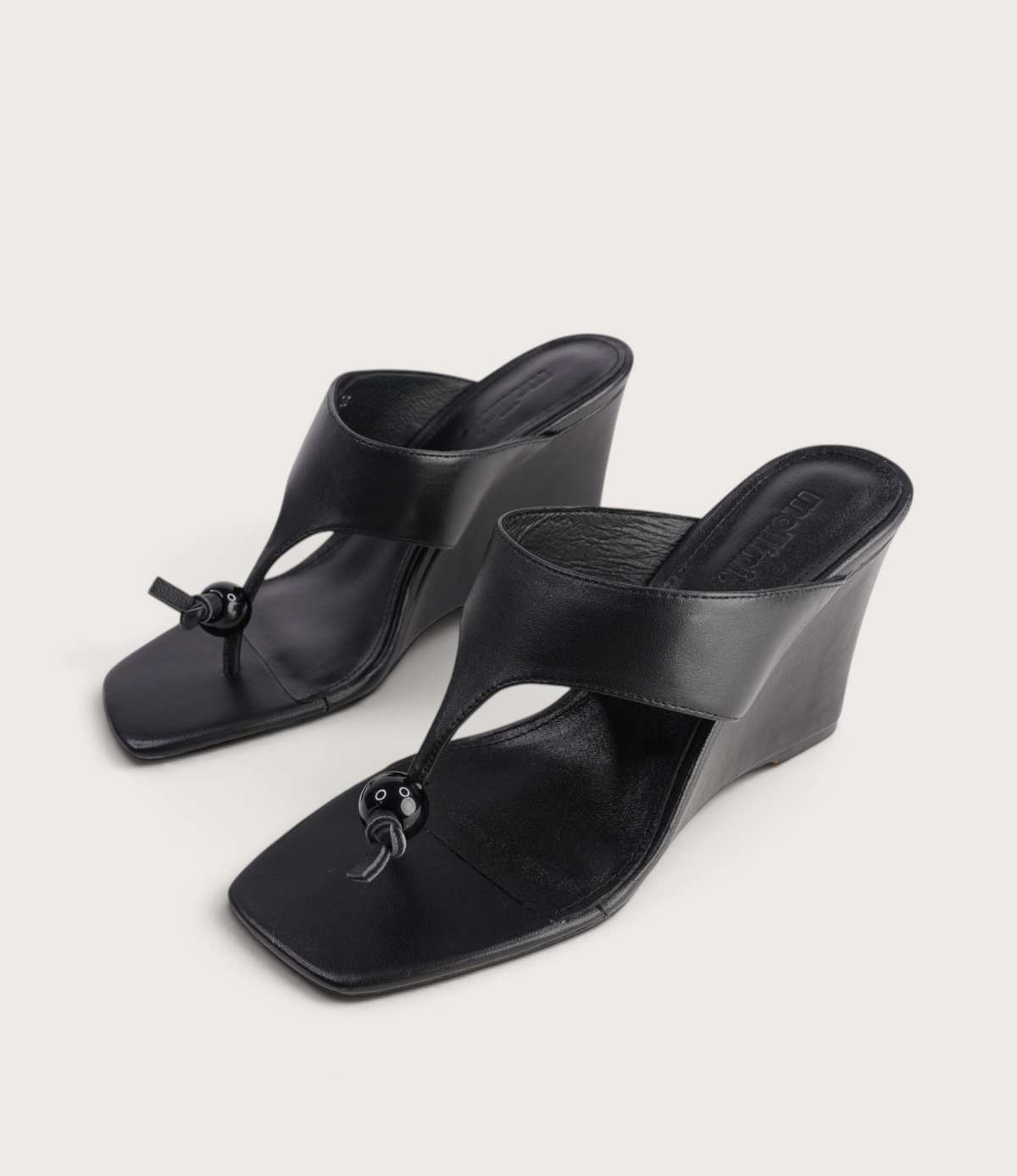 Adrew Black Leather Wedges