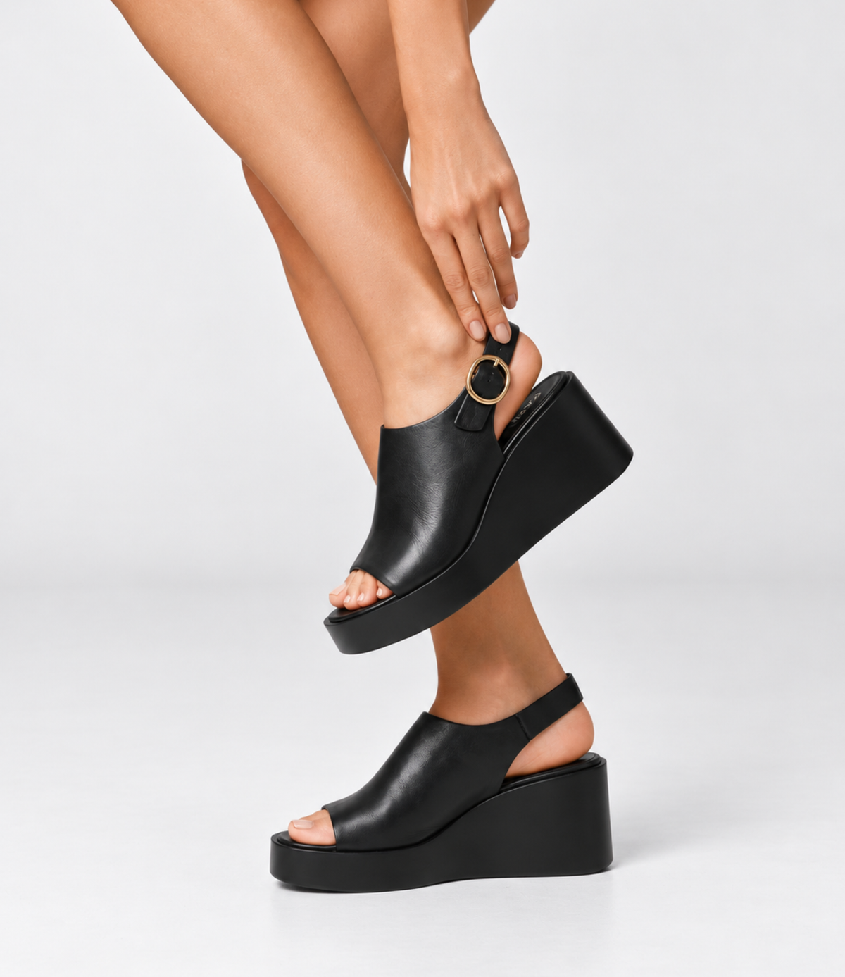 Ariani Black Leather Wedges