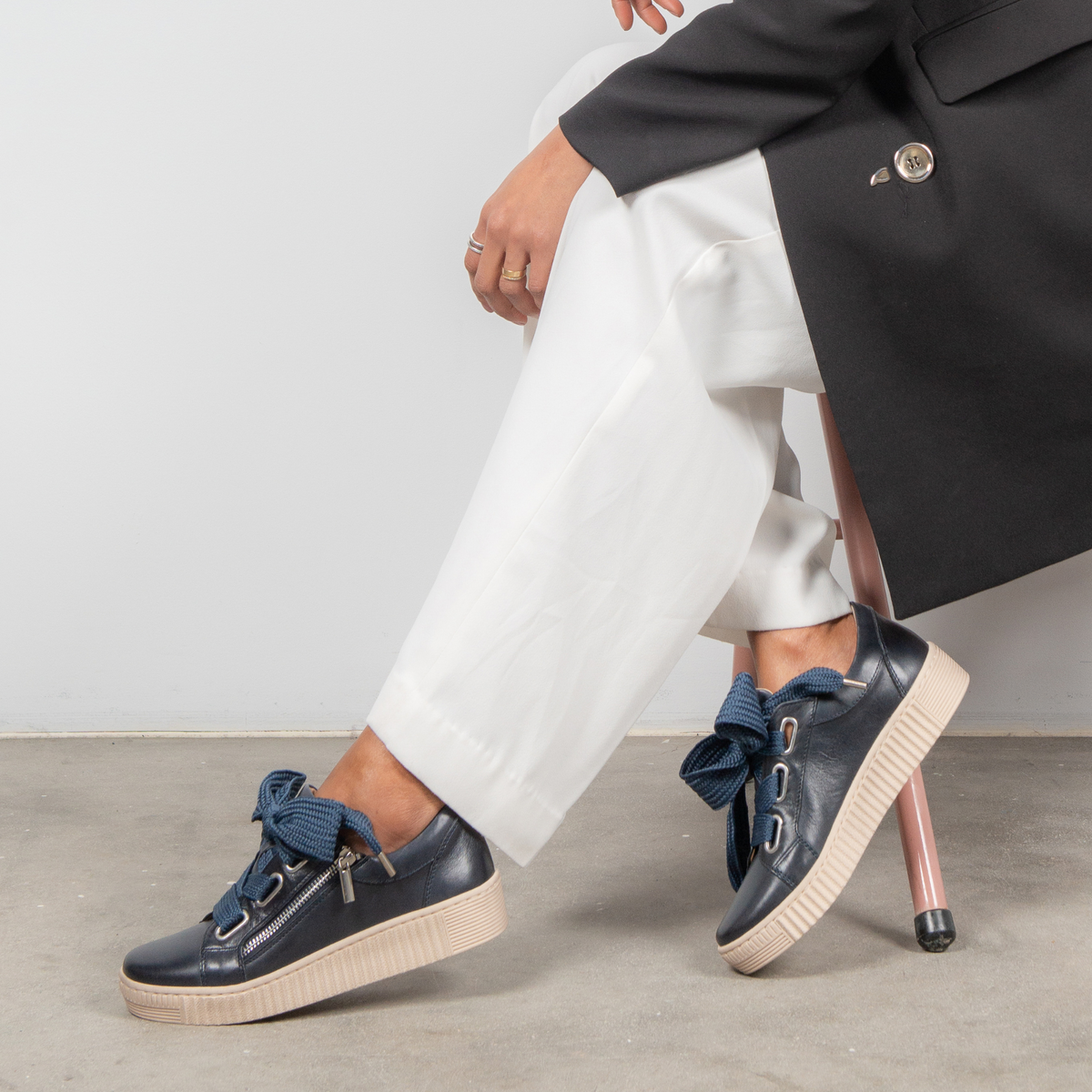 Jovi navy leather sneakers by EOS Footwear, featuring a sleek design and comfortable fit for ladies' casual wear.