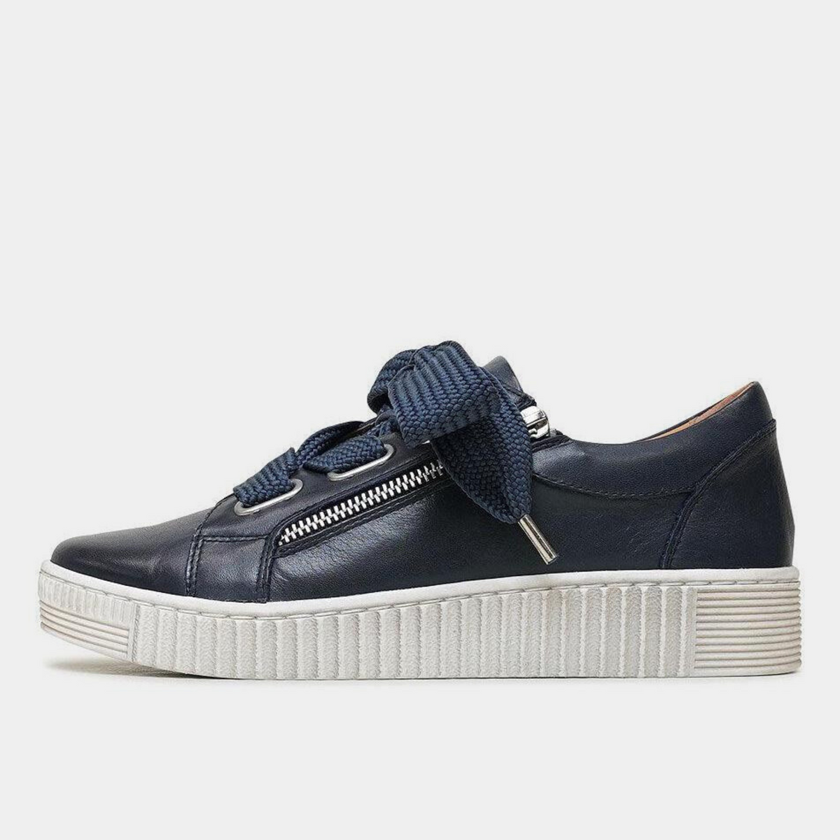 Navy leather sneakers for ladies by EOS Footwear, featuring a sleek design and comfortable casual style.