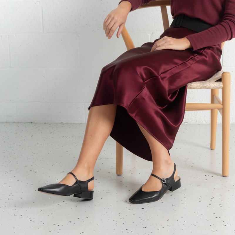 Gleam Black Leather Flats