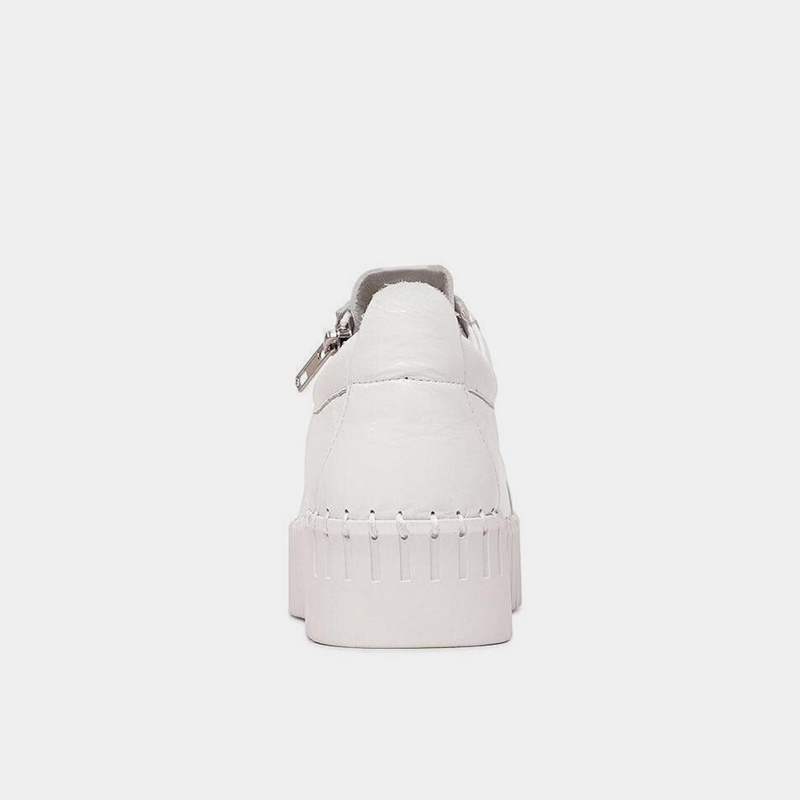 Bump White Patent Leather Sneakers