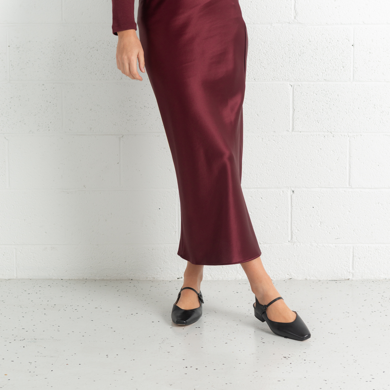 Gleam Black Leather Flats