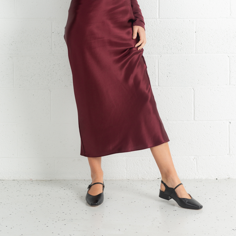 Gleam Black Leather Flats