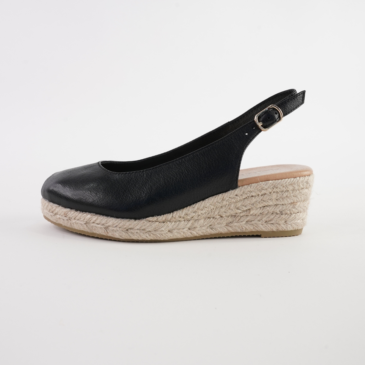 Black leather espadrille wedges for women by Django and Juliette, featuring a stylish, casual design and elevated heel.