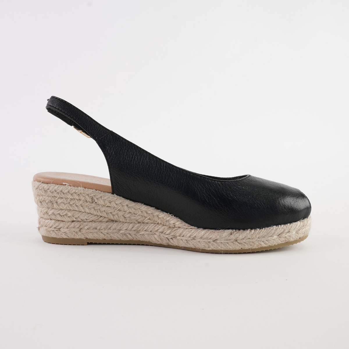 Saniarly black leather espadrille wedges by Django and Juliette featuring a stylish design and woven jute sole.