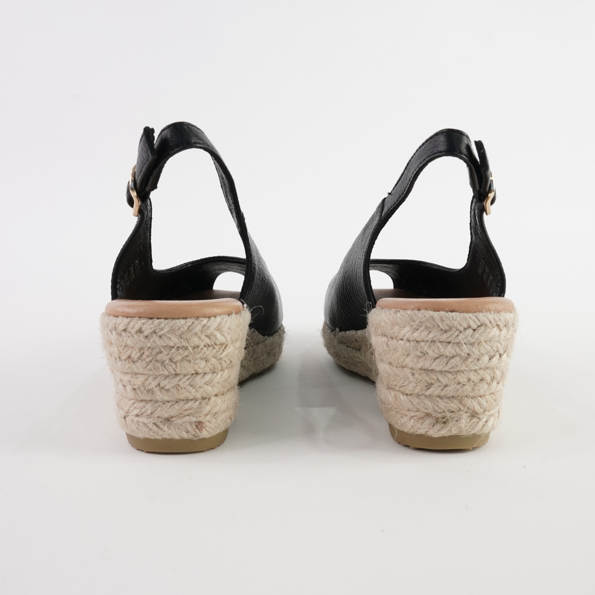Black leather espadrille wedges by Django and Juliette, featuring a stylish design suitable for casual ladies' footwear.
