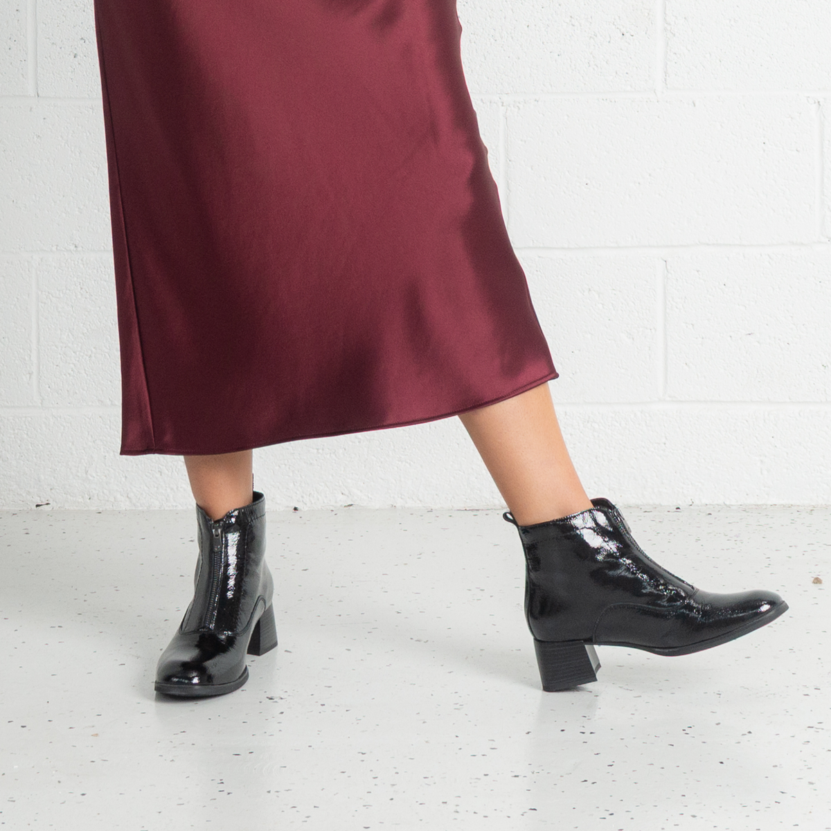Earth Black Crinkle Patent Leather Ankle Boots