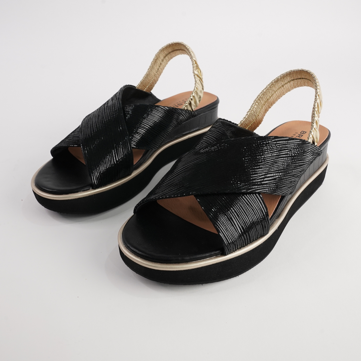 Debacle Black/ Gold Leather Sandals
