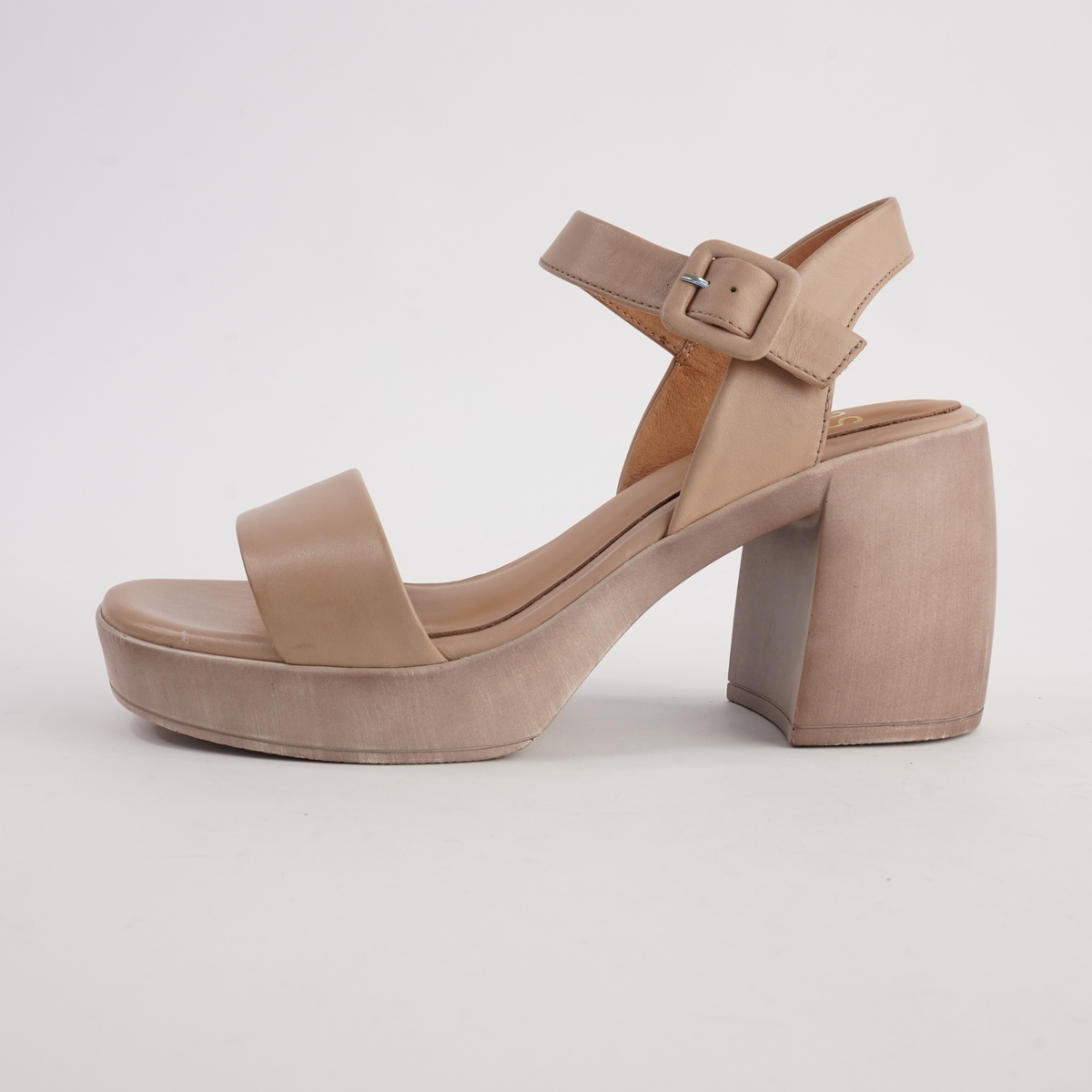 Spice tan leather heels for ladies by EOS Footwear, featuring a sleek design and stylish silhouette.