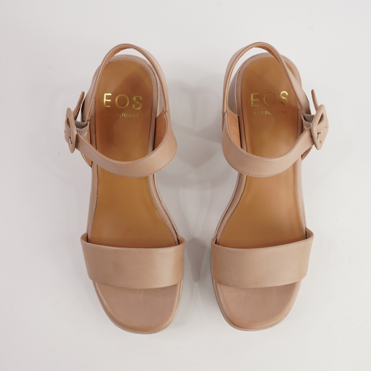 Spice tan leather heels by EOS Footwear, featuring a stylish design and elegant silhouette for ladies.