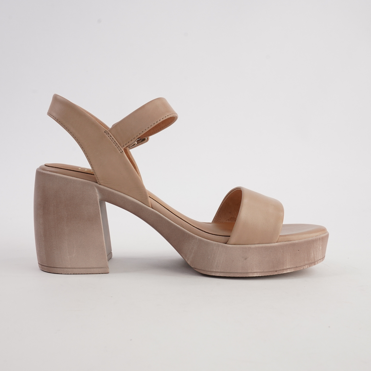 Spice tan leather heels for ladies by EOS Footwear, featuring a sleek design and comfortable fit.