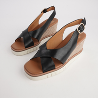 Hayla Black Leather Wedges
