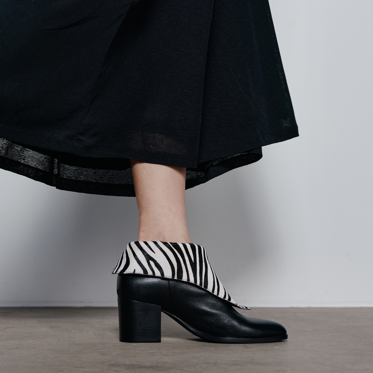Zenon Black Leather/ Black and White Zebra Pony Ankle Boots - DJANGO AND JULIETTE | Shouz