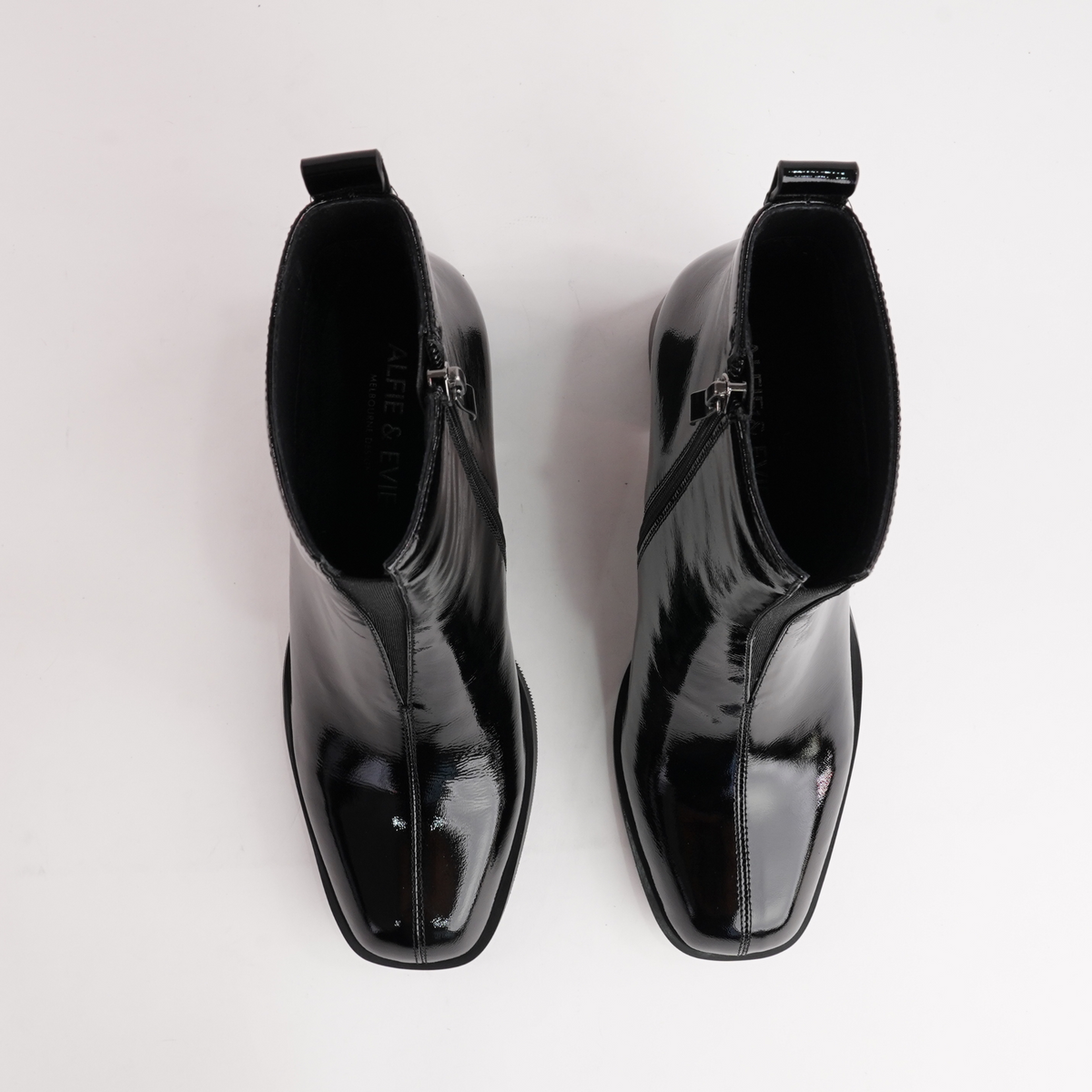 Earth Black Crinkle Patent Leather Ankle Boots - ALFIE AND EVIE | Shouz